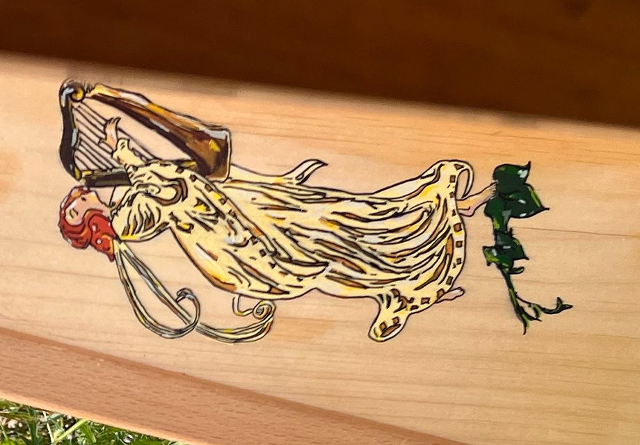 Custom decoration detail: carving, gold leaf or soundboard painting